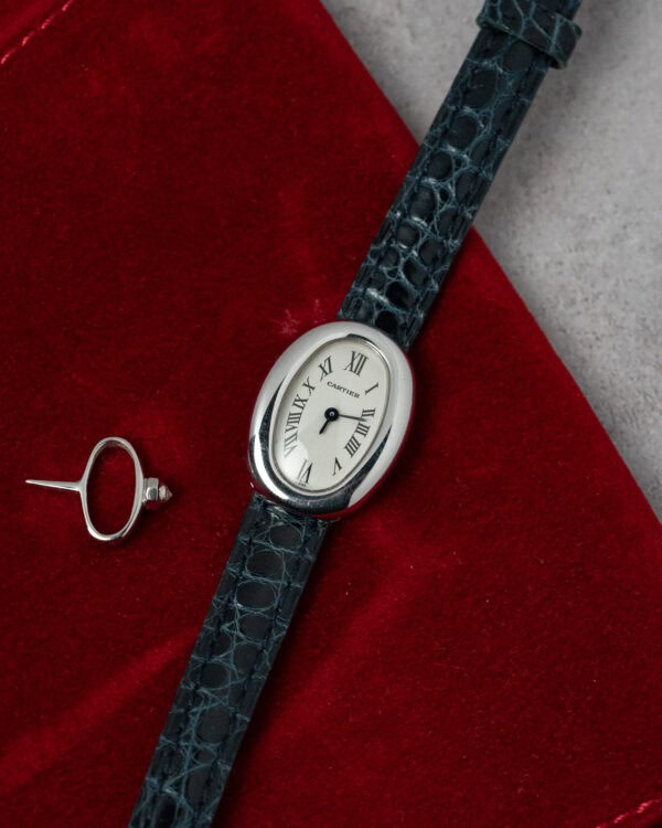 Cartier Baignoire 2369 Flat lay with cartier pouch